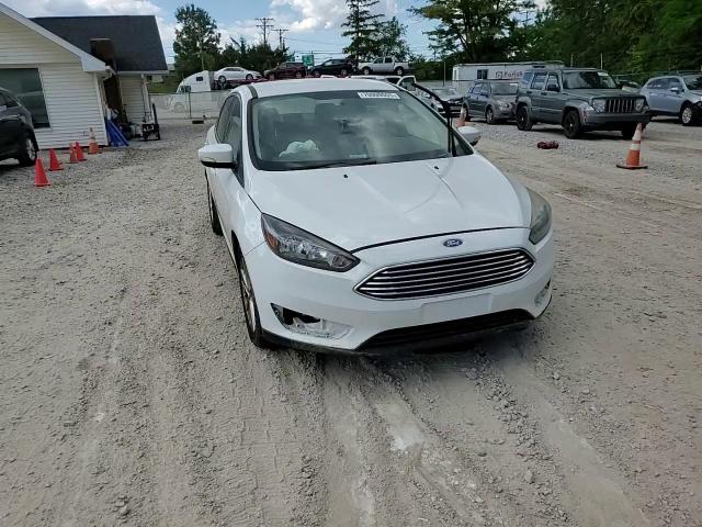 2016 Ford Focus Se VIN: 1FADP3F26GL236111 Lot: 70999005