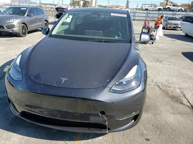 2025 Tesla Model Y VIN: 7SAYGDED4SF276982 Lot: 81787935