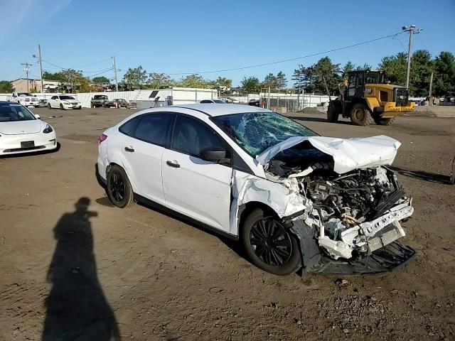 2017 Ford Focus S VIN: 1FADP3E26HL293671 Lot: 83860055