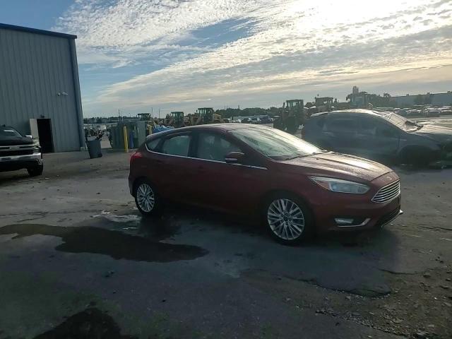 2016 Ford Focus Titanium VIN: 1FADP3N23GL327869 Lot: 81275695