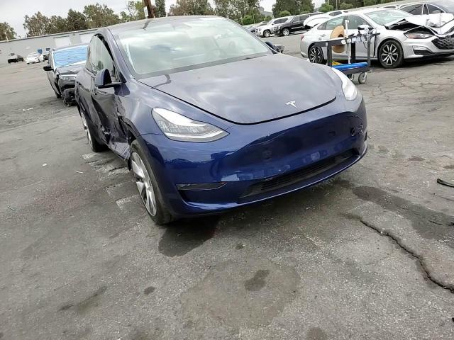 2023 Tesla Model Y VIN: 7SAYGDEE2PA088961 Lot: 80207605
