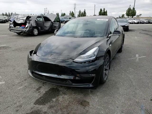 2018 Tesla Model 3 VIN: 5YJ3E1EA7JF151703 Lot: 72031845