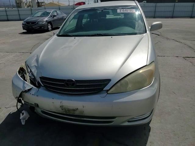 2003 Toyota Camry Le VIN: JTDBE32K330238018 Lot: 81648195