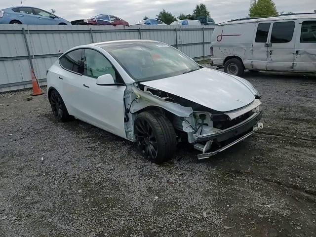 2023 Tesla Model Y VIN: 7SAYGDEF9PF897076 Lot: 71784135