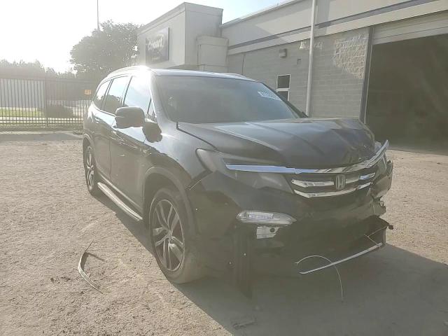 2017 Honda Pilot Touring VIN: 5FNYF6H99HB039125 Lot: 81526055