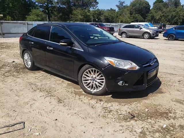 2014 Ford Focus Titanium VIN: 1FADP3J25EL201791 Lot: 71055575