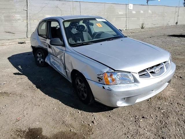 2001 Hyundai Accent Gs VIN: KMHCG35CX1U138406 Lot: 81693065
