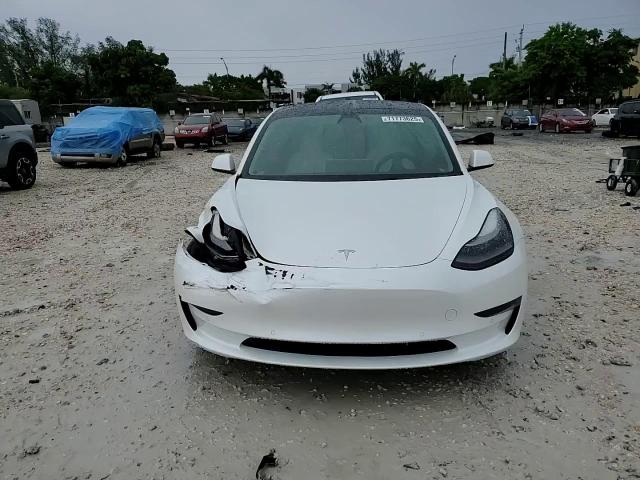 2021 Tesla Model 3 VIN: 5YJ3E1EA2MF098543 Lot: 71773625