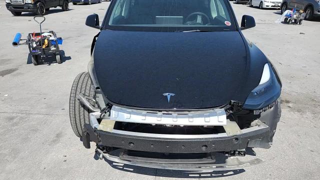 2025 Tesla Model Y VIN: 7SAYGAEE7SF245152 Lot: 80527575