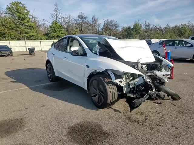 2026 Tesla Model Y VIN: 7SAYGDEEXTA487577 Lot: 81967425