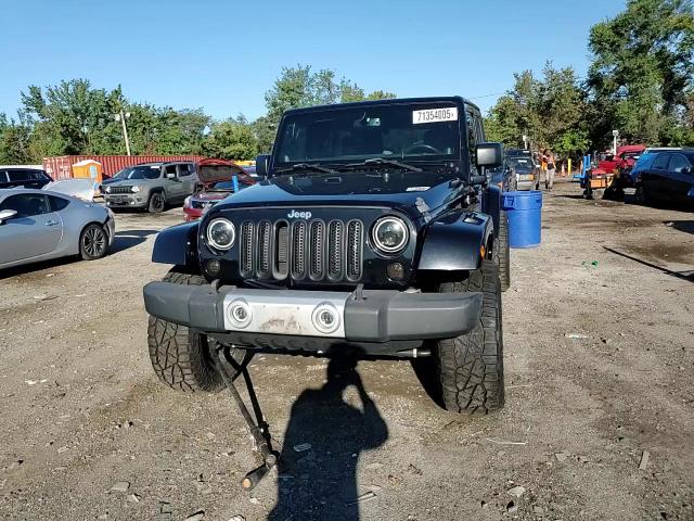 2014 Jeep Wrangler Unlimited Sahara VIN: 1C4BJWEG0EL277994 Lot: 71354005
