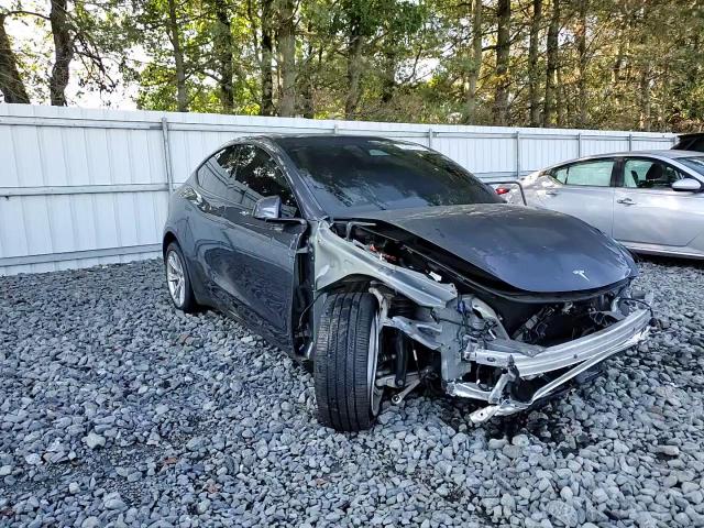 2023 Tesla Model Y VIN: 7SAYGDEE2PA210900 Lot: 80301515