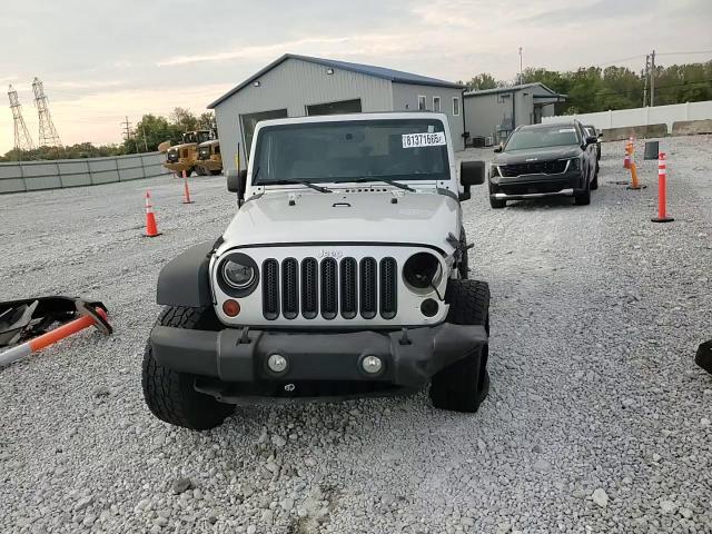 2010 Jeep Wrangler Sport VIN: 1J4AA2D11AL228325 Lot: 81371665