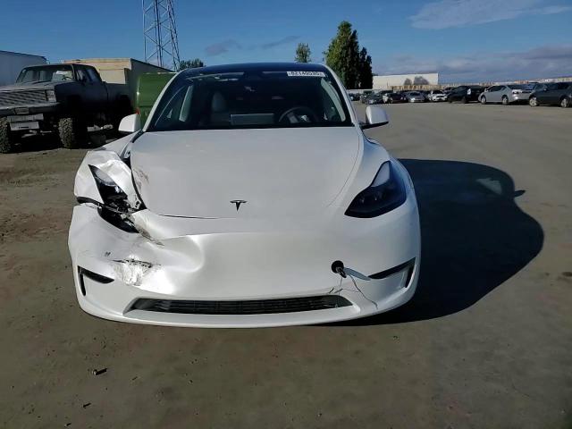 2024 Tesla Model Y VIN: 7SAYGDED3RF111452 Lot: 82140535