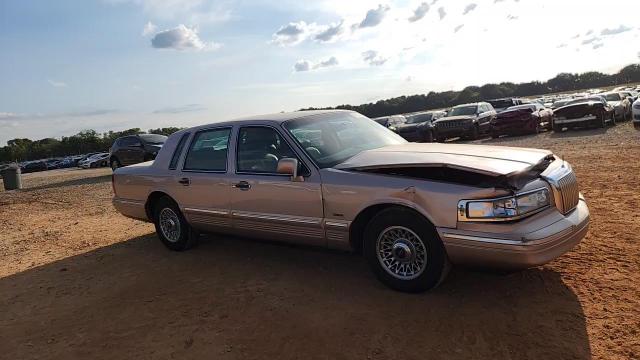 1996 Lincoln Town Car Executive VIN: 1LNLM81W9TY702967 Lot: 71869405