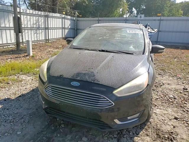 2017 Ford Focus Titanium VIN: 1FADP3J28HL338762 Lot: 81418175