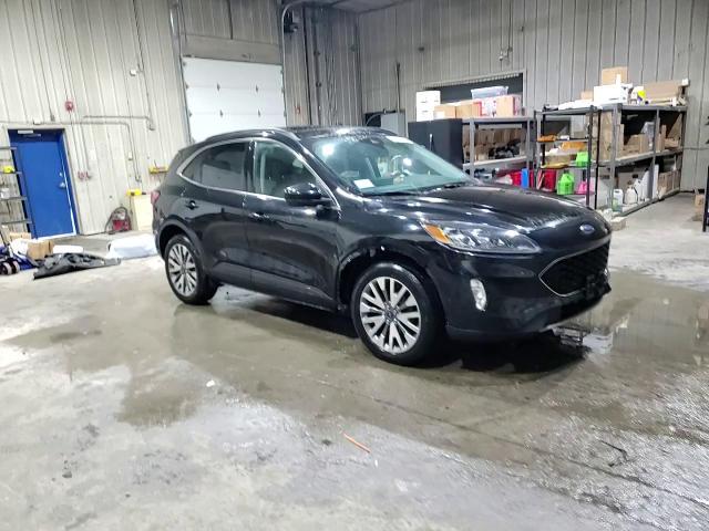 2021 Ford Escape Titanium VIN: 1FMCU9J97MUA57258 Lot: 82031815