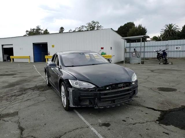 2014 Tesla Model S VIN: 5YJSA1H15EFP55890 Lot: 83936185