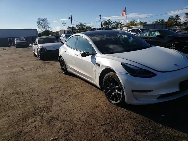 2022 Tesla Model 3 VIN: 5YJ3E1EB9NF198391 Lot: 84250375