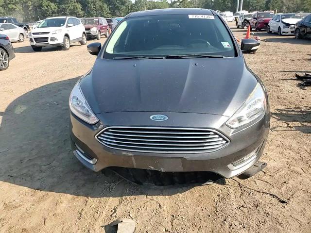 2017 Ford Focus Titanium VIN: 1FADP3J23HL294248 Lot: 71674735