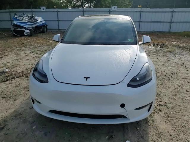 2023 Tesla Model Y VIN: 7SAYGDEF3PF940472 Lot: 81728045
