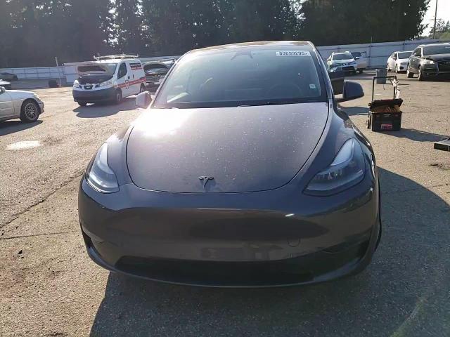 2023 Tesla Model Y VIN: 7SAYGDEE0PF805831 Lot: 80699295