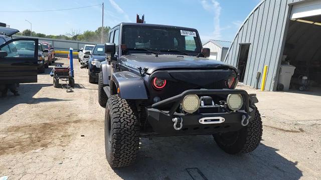 2014 Jeep Wrangler Unlimited Rubicon VIN: 1C4BJWFG1EL285780 Lot: 80501325