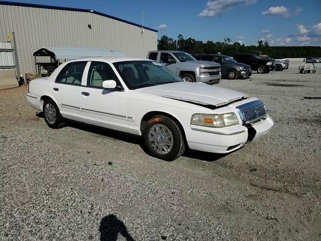 2006 Mercury Grand Marquis Gs VIN: 2MEFM74VX6X651982 Lot: 80440275