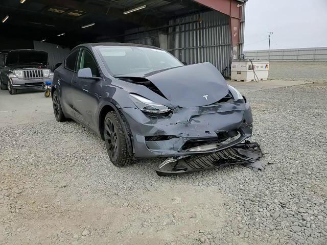 2023 Tesla Model Y VIN: 7SAYGDEE6PF648726 Lot: 71992925