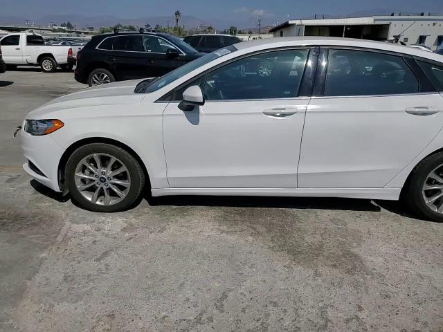 2017 Ford Fusion Se Hybrid VIN: 3FA6P0LU1HR324001 Lot: 84752495