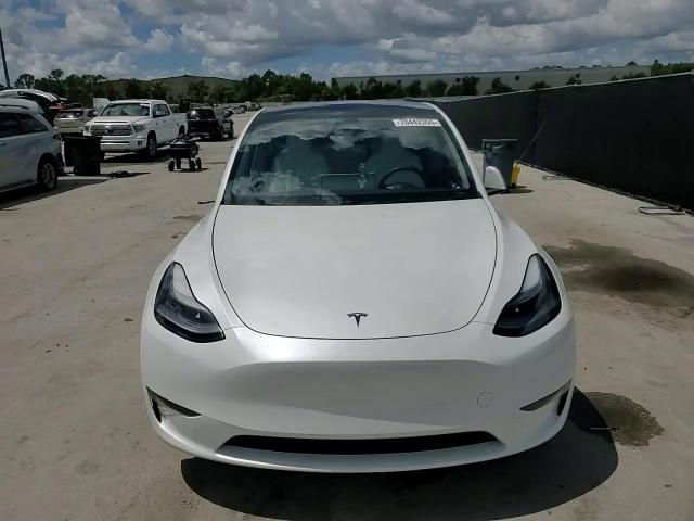 2025 Tesla Model Y VIN: 7SAYGAEE9SF261434 Lot: 70442355