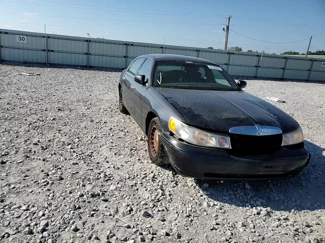 1999 Lincoln Town Car Signature VIN: 1LNHM82W4XY704135 Lot: 84196655