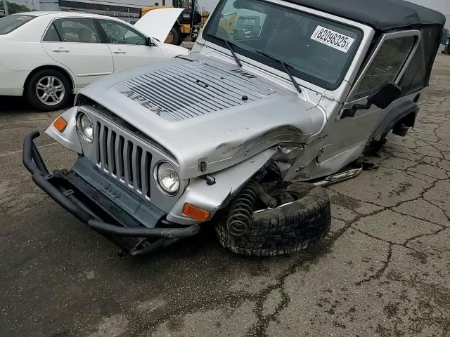 2002 Jeep Wrangler / Tj X VIN: 1J4FA39S22P751313 Lot: 82098325