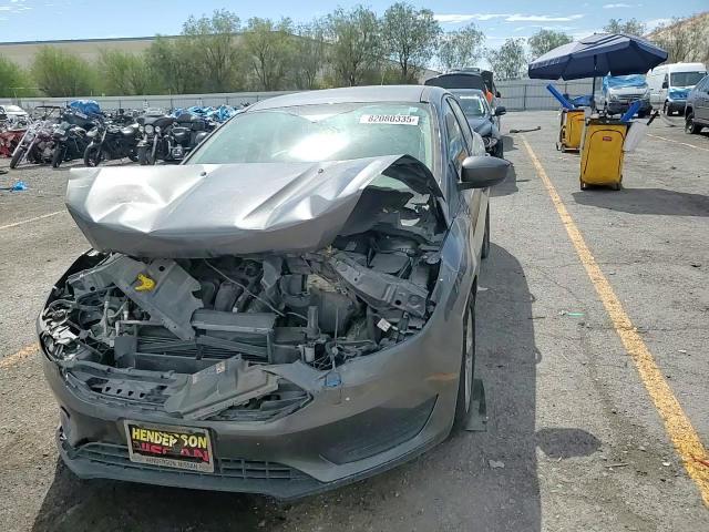 2018 Ford Focus Se VIN: 1FADP3F25JL304079 Lot: 82080335