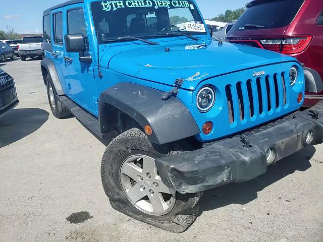 2011 Jeep Wrangler Unlimited Sport VIN: 1J4BA3H18BL601799 Lot: 84166995