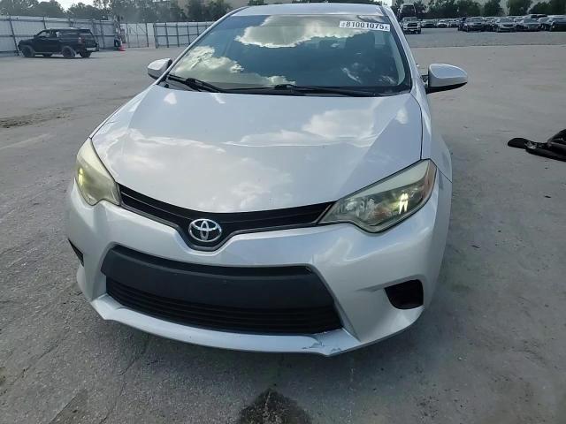 2014 Toyota Corolla L VIN: 5YFBURHE9EP135136 Lot: 81001075