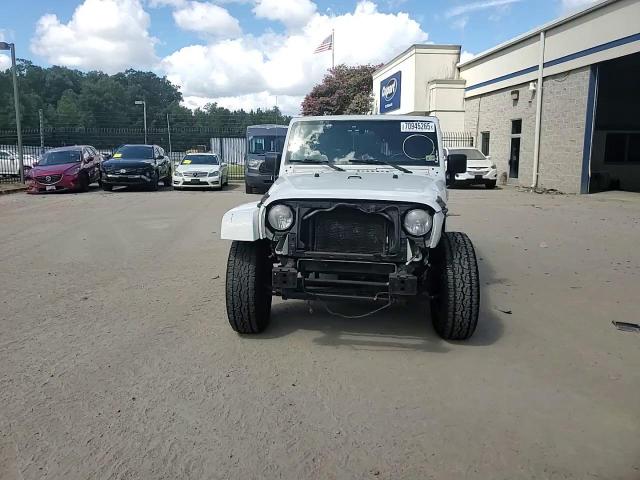 2010 Jeep Wrangler Unlimited Sahara VIN: 1J4BA5H14AL228688 Lot: 70945265
