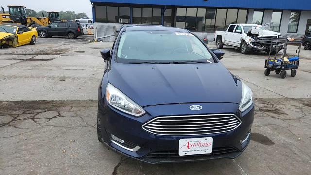 2016 Ford Focus Titanium VIN: 1FADP3N21GL321553 Lot: 81712795