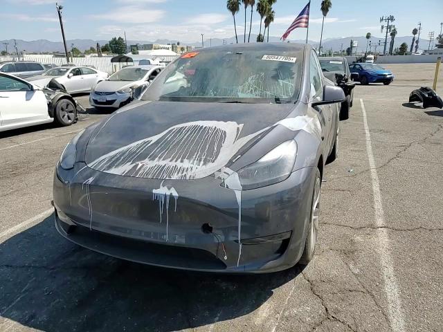 2023 Tesla Model Y VIN: 7SAYGAEE5PF812336 Lot: 80547705