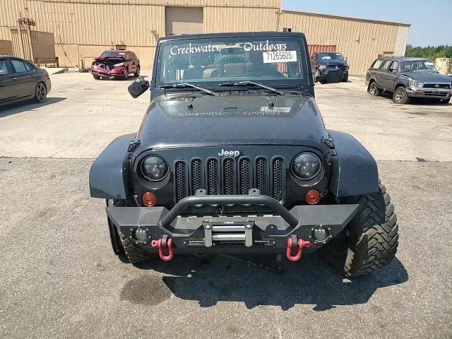 2011 Jeep Wrangler Unlimited Sahara VIN: 1J4HA5H13BL619987 Lot: 71265605