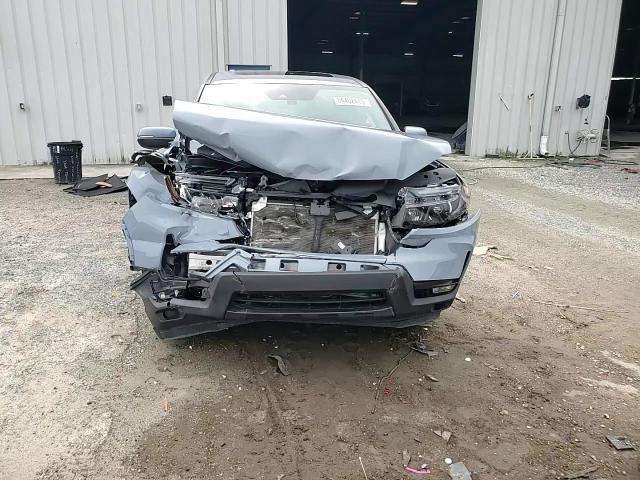 2022 Honda Passport Exl VIN: 5FNYF7H55NB007030 Lot: 84402415