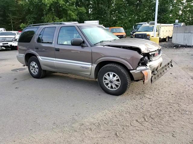 1999 GMC Jimmy VIN: 1GKDT13W9X2556700 Lot: 81556205