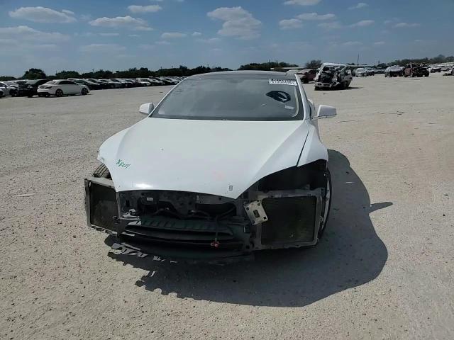 2014 Tesla Model S VIN: 5YJSA1H19EFP30717 Lot: 81050495