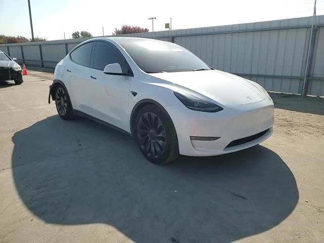 2023 Tesla Model Y VIN: 7SAYGDEF0PF811881 Lot: 80493645