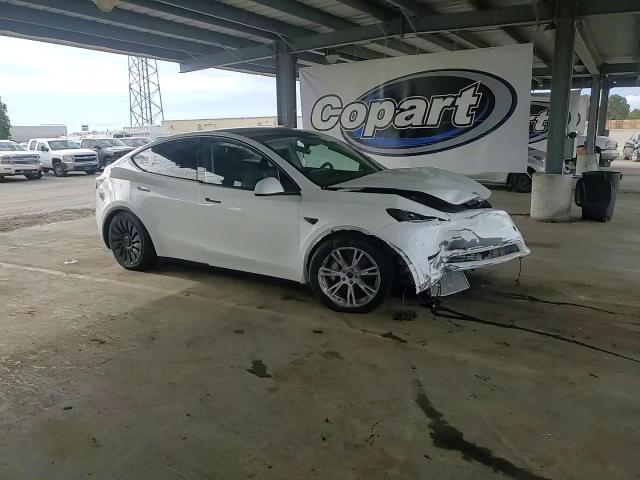 2023 Tesla Model Y VIN: 7SAYGDEE6PF826909 Lot: 81934295