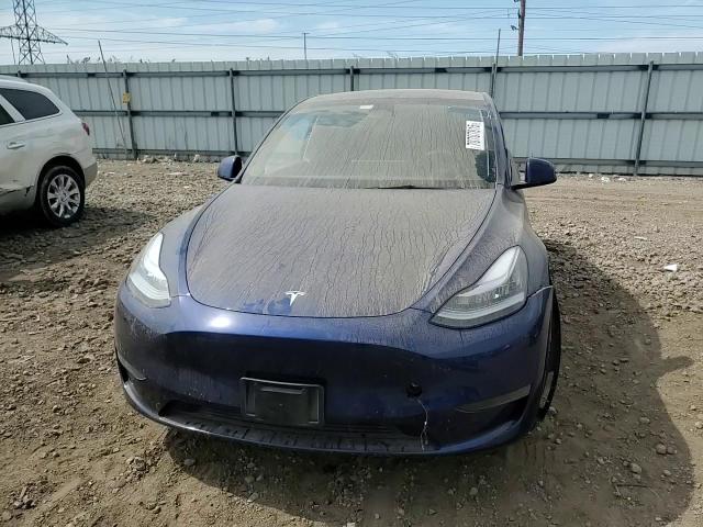2023 Tesla Model Y VIN: 7SAYGDEE1PA067020 Lot: 70707815