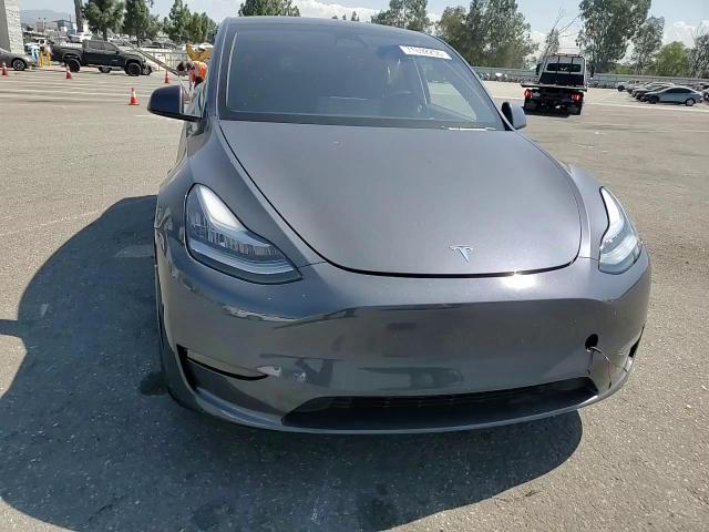 2023 Tesla Model Y VIN: 7SAYGDEE0PA039788 Lot: 71692255