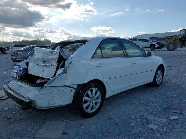 2002 Toyota Camry Le VIN: 4T1BE32K52U112567 Lot: 84189535