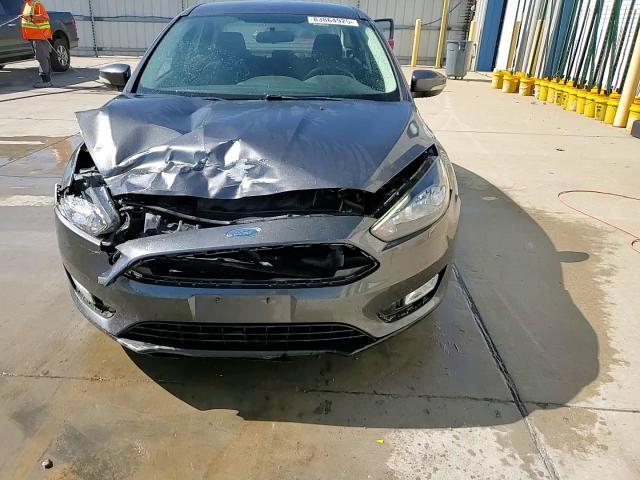 2018 Ford Focus Se VIN: 1FADP3FE2JL228413 Lot: 83864925