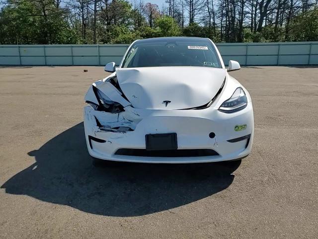 2024 Tesla Model Y VIN: 7SAYGDEE3RF199525 Lot: 80076345